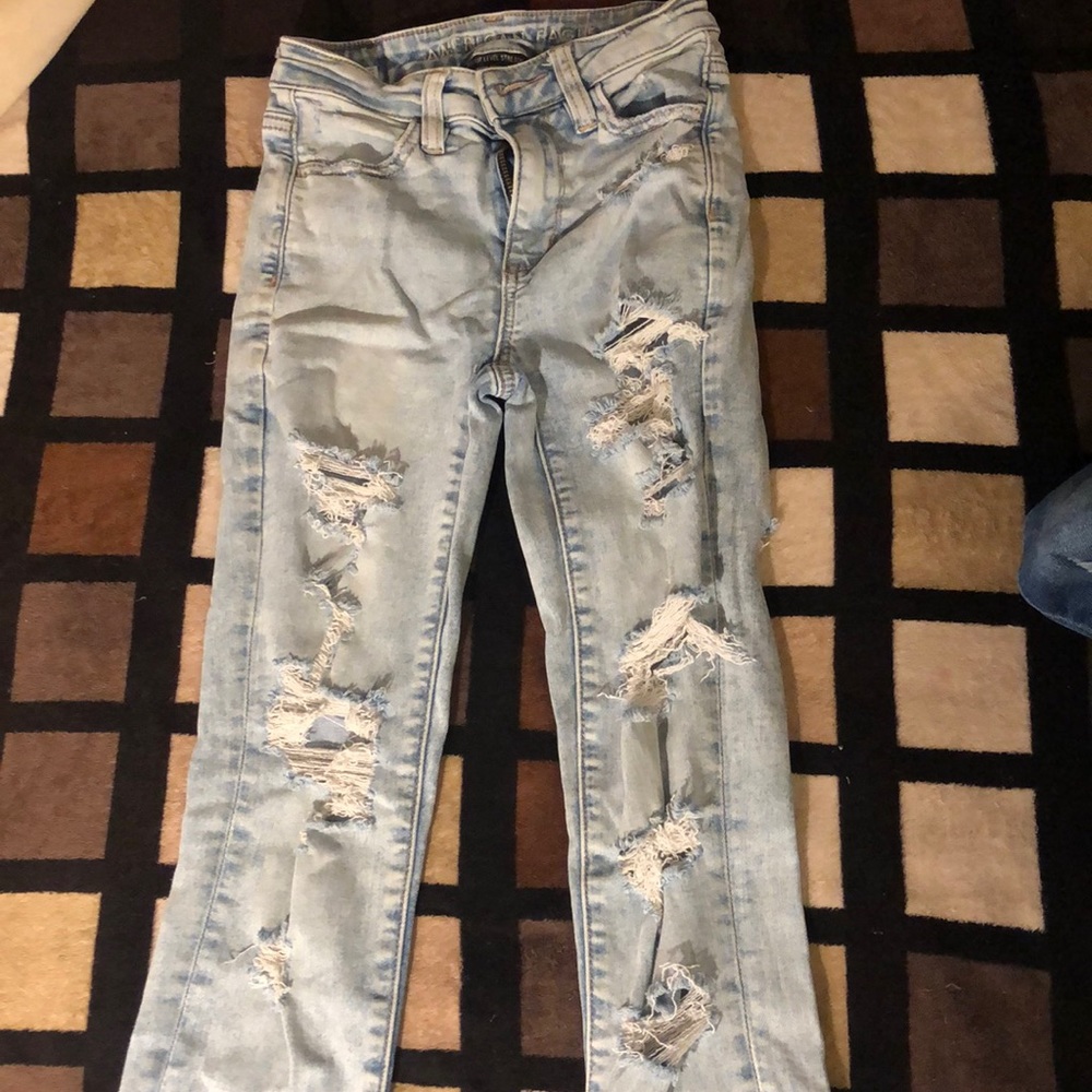 American eagle next level stretch light blue ripped jeans (size 000)